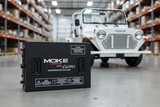 Lithium battery foreground with Moke behind